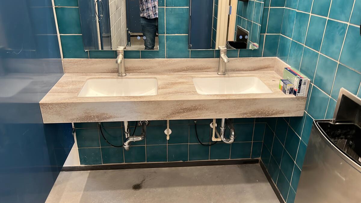 Double restroom vanity installation